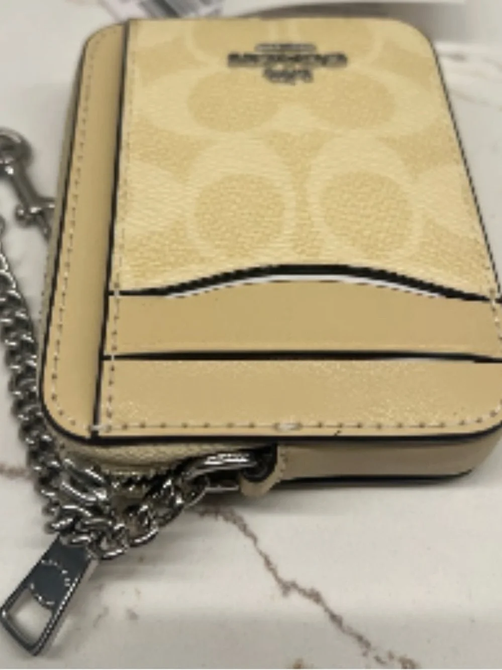 Coach Zip Card Case In Signature Canvas in the color Hay